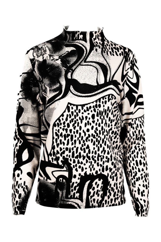 Langarmshirt mit Stehkragen und auffälligem Schwarz-Weiß-Print. Das Design kombiniert abstrakte Linien mit Animal-Print-Elementen und floralen Details zu einem modernen, grafischen Statement-Piece.
