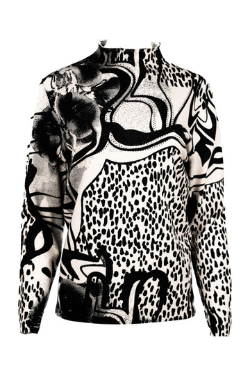 Langarmshirt mit Stehkragen und auffälligem Schwarz-Weiß-Print. Das Design kombiniert abstrakte Linien mit Animal-Print-Elementen und floralen Details zu einem modernen, grafischen Statement-Piece.